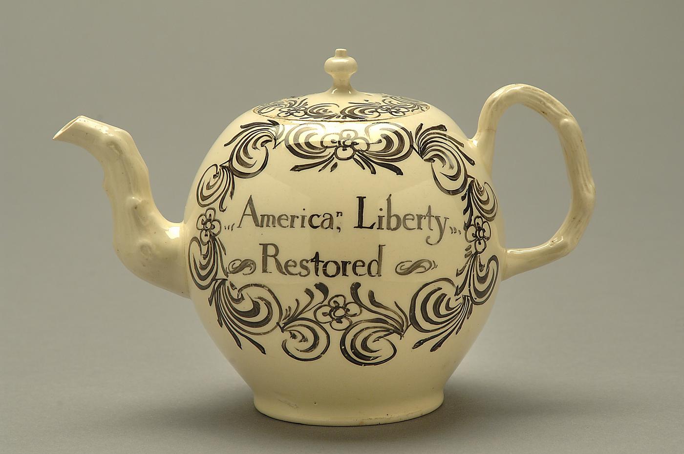 The teapot’s reverse reads America, Liberty Restored